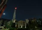 GOD'S MILLS (2019), Signal Festival Prague 2019, Prague (CZ) – Pavel Korbička, kinetic site-specific installation, chimney, LED technology, second hand of the clock, 300 cm, Corso Court complex, photo: Alex Dobrovodský